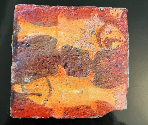 Tile of two pike from Alton Museum